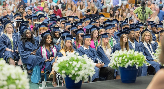 Students give their attention to the speakers during graduation ceremonies for Burlington High School on Thursday, June 13, 2024, at University of Vermont Patrick Gymnasium in Burlington.