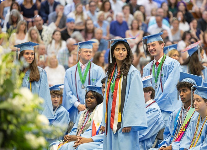 Students stand for recognition of Seal of Biliteracy during graduation ceremonies for South Burlington High School on Friday, June 14, 2024, at University of Vermont's Patrick Gymnasium in Burlington.