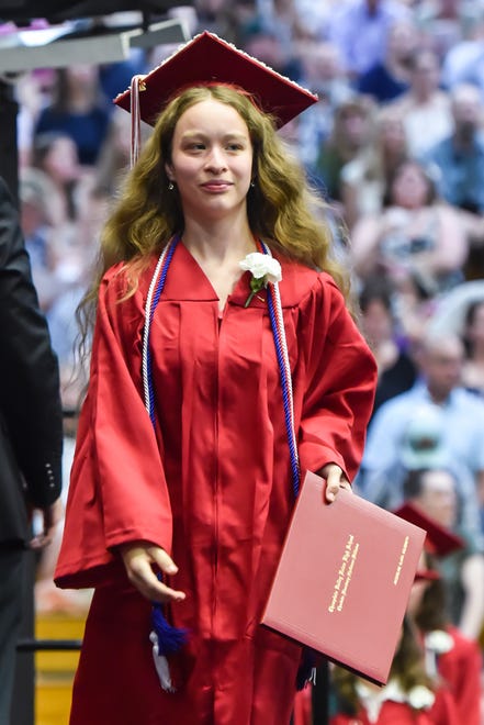 Jacqueline Goldsmith, a graduate of the class of 2024, receives her diploma at the 60th Commencement Exercise of the Champlain Valley Union High School on Friday, June 14, 2024, at UVM's Patrick Gym in Burlington.