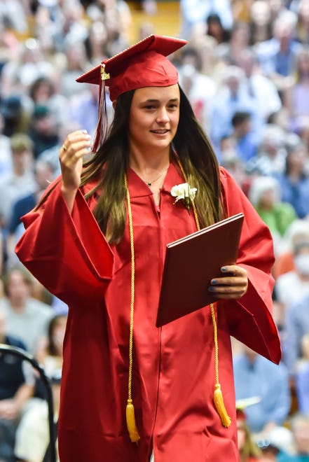 Kaitlin Boehmcke, a graduate of the class of 2024, receives her diploma at the 60th Commencement Exercise of the Champlain Valley Union High School on Friday, June 14, 2024, at UVM's Patrick Gym in Burlington.