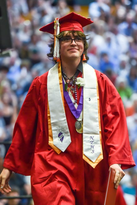 Jeremiah Batre,s a graduate of the class of 2024, receives his diploma at the 60th Commencement Exercise of the Champlain Valley Union High School on Friday, June 14, 2024, at UVM's Patrick Gym in Burlington.