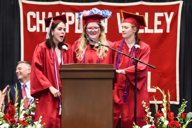 Sierra Carrier-Potter, Elizabeth Parent and Grace Thompson present the class gift at the 60th Commencement Exercise of the Champlain Valley Union High School on Friday, June 14, 2024, at UVM's Patrick Gym in Burlington.