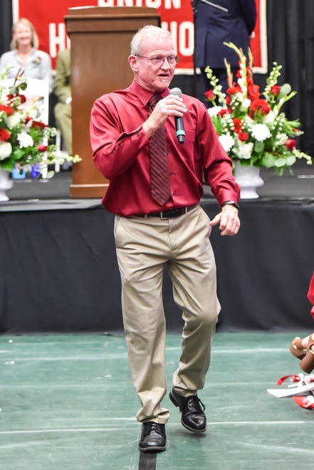 Rahn Flemming leads the school "rally" cheer at the 60th Commencement Exercise of the Champlain Valley Union High School on Friday, June 14, 2024, at UVM's Patrick Gym in Burlington.