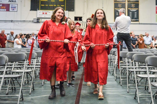 Mira Novak and Hannah Steinare, the 2024 Class Marshalls, at the 60th Commencement Exercise of the Champlain Valley Union High School on Friday, June 14, 2024, at UVM's Patrick Gym in Burlington.