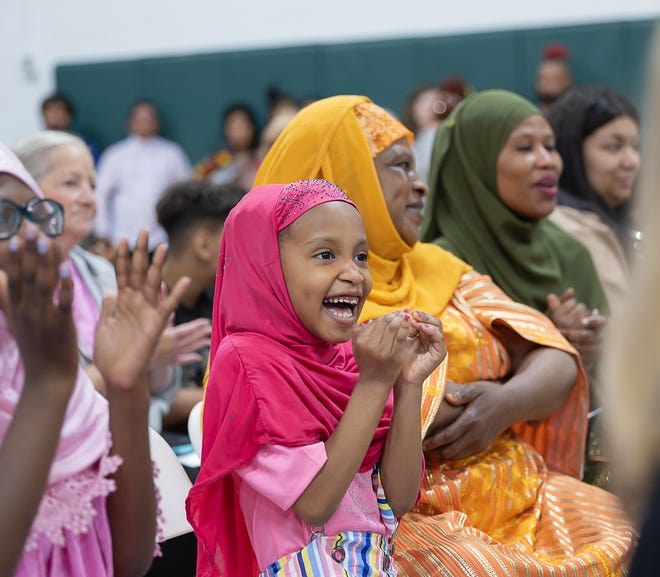 Younger siblings cheer for their graduates during graduation ceremonies for Winooski High School on Saturday, June 15, 2024, at Winooski High School in Winooski.