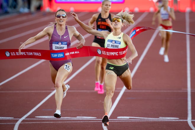 Elle St. Pierre, right, edges out Elise Cranny for first place in the women’s 5,000 meters during day four of the U.S. Olympic Track & Field Trials Monday, June 24, 2024, at Hayward Field in Eugene, Ore.