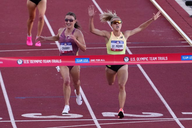 Elle St. Pierre defeats Elise Cranny to win the women's 5,000m in a meet record 14:40.34 to 14:40.36 during the US Olympic Team Trials at Hayward Field.