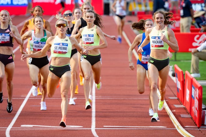 Elle St. Pierre, left, wins the first round of the women’s 1,500 meters ahead of Emily Mackay, right, during day seven of the U.S. Olympic Track & Field Trials Thursday, June 27, 2024, at Hayward Field in Eugene, Ore.