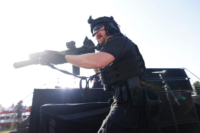 A law enforcement officer in action during Trump's rally on July 13, 2024, in Butler, Pennsylvania.