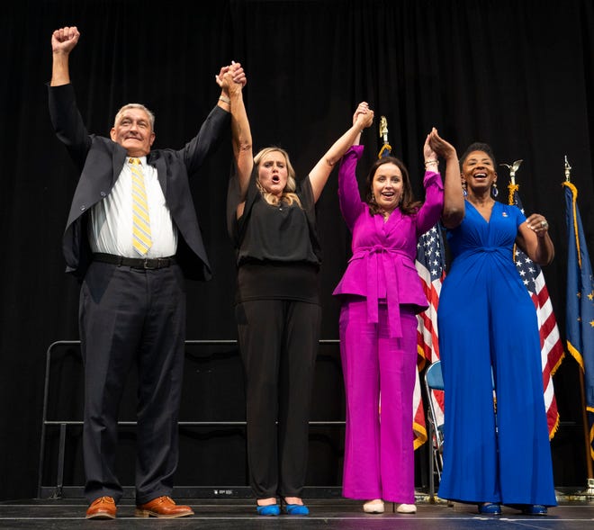 From left, Terry Goodin, nominee for lieutenant governor, Jennifer McCormick, nominee for governor, Destiny Wells, nominee for attorney general, and Valerie McCray, nominee for U.S. Senate, celebrate their victories Saturday, July 13, 2024, during the Indiana Democratic State Convention in Indianapolis.