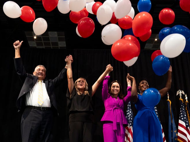 From left, Terry Goodin, nominee for lieutenant governor, Jennifer McCormick, nominee for governor, Destiny Wells, nominee for attorney general, and Valerie McCray, nominee for U.S. Senate, celebrate their victories Saturday, July 13, 2024, during the Indiana Democratic State Convention in Indianapolis.