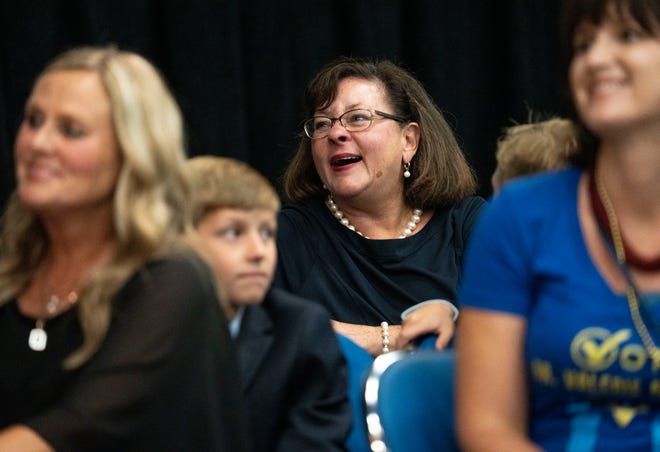 Beth White reacts as Destiny Wells gives her acceptance speech for earning the Democratic nomination for attorney general Saturday, July 13, 2024, during the Indiana Democratic State Convention in Indianapolis.