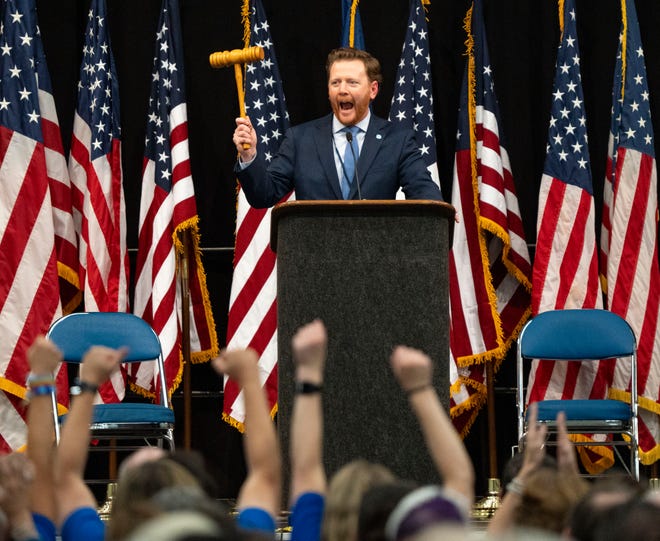 Mike Schmuhl, Democrat state party chair, shows his gavel Saturday, July 13, 2024, during the Indiana Democratic State Convention in Indianapolis.