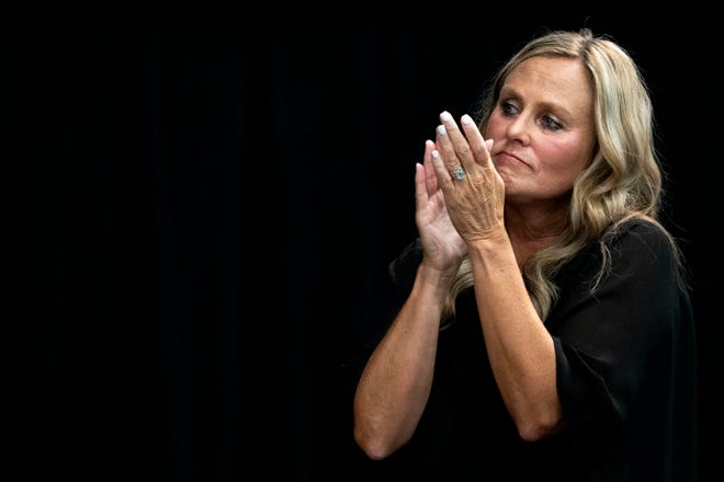 Jennifer McCormick, Democrat nominee for governor, claps as Terry Goodin gives an acceptance speech after receiving the Democratic nomination for lieutenant governor on Saturday, July 13, 2024, during the Indiana Democratic State Convention in Indianapolis.