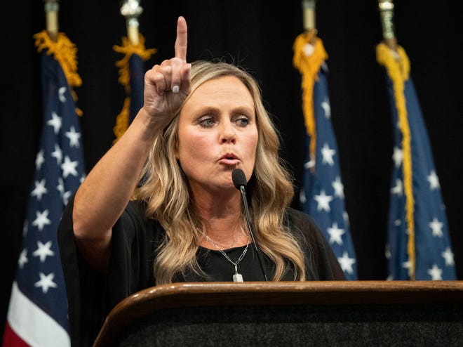 Jennifer McCormick, Democrat nominee for governor, celebrates the lieutenant governor and attorney general nominees on Saturday, July 13, 2024, during the Indiana Democratic State Convention in Indianapolis.