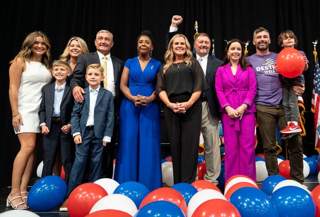 The 2024 Indiana Democratic ticket poses for a photo Saturday, July 13, 2024, after the Indiana Democratic State Convention in Indianapolis.