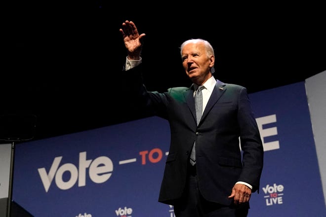 US President Joe Biden waves on stage during the Vote To Live Properity Summit at the College of Southern Nevada in Las Vegas, Nevada, on July 16, 2024.