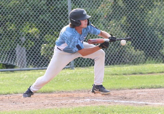 Mason Sweetser drops down a bunt during the South Burlington Wildcats 3-2 win over St Johnsbury Post 58 on Tuesday night at Veterans Memorial Park in South Burlington.