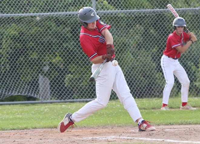 Tate Parker connects on a pitch during St Johnsbury Post 58's 3-2 loss to the South Burlington Wildcats on Tuesday night at Veterans Memorial Park in South Burlington.