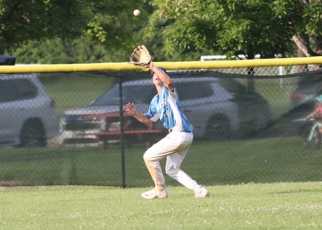 Liam Wheeler tracks down a fly ball during the South Burlington Wildcats 3-2 win over St Johnsbury Post 58 on Tuesday night at Veterans Memorial Park in South Burlington.