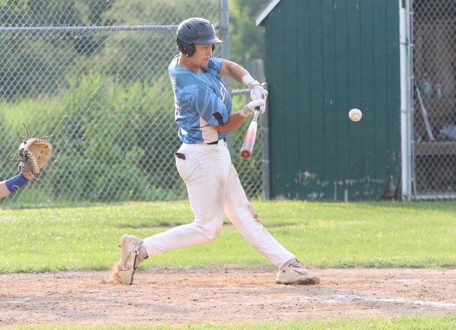 Kyle Tanis takes a swing at a pitch during the South Burlington Wildcats 3-2 win over St Johnsbury Post 58 on Tuesday night at Veterans Memorial Park in South Burlington.