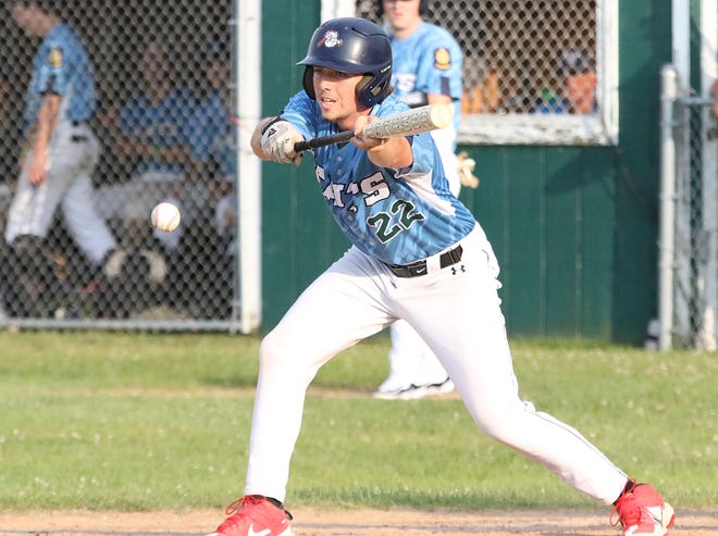 Adam Littlefield drops down a bunt during the South Burlington Wildcats 3-2 win over St Johnsbury Post 58 on Tuesday night at Veterans Memorial Park in South Burlington.