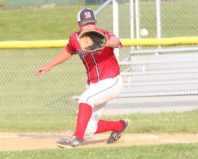 First baseman Brody Kingsbury keeps his eyes on the ball during a throw to 1st in St Johnsbury Post 58's 3-2 loss to the South Burlington Wildcats on Tuesday night at Veterans Memorial Park in South Burlington.