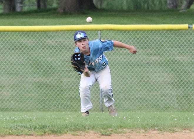 Centerfielder Cedric LaMothe eyes a line drive during the South Burlington Wildcats 3-2 win over St Johnsbury Post 58 on Tuesday night at Veterans Memorial Park in South Burlington.