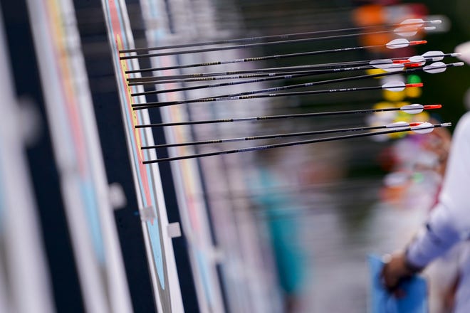 Arrows stick out from a target during the Paris 2024 Olympic Summer Games at Invalides.