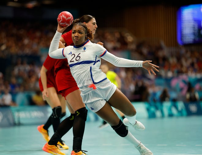 Team France line player Pauletta Foppa (26) in action against Hungary in a women's handball group B match during the Paris 2024 Olympic Summer Games at South Paris Arena 6.