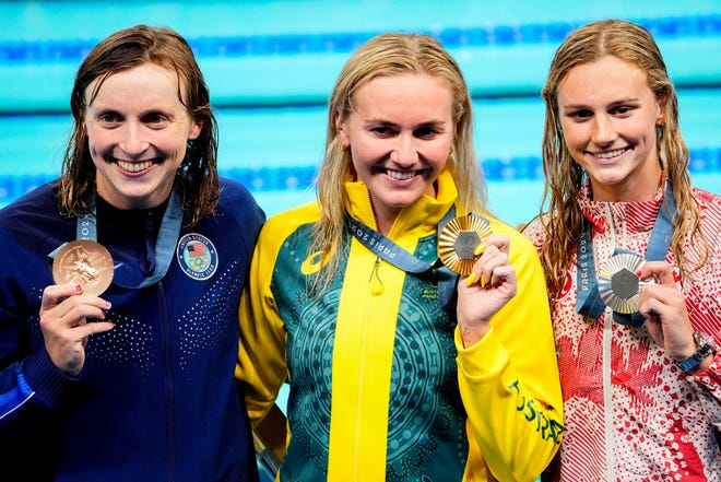 Katie Ledecky (USA), Ariarne Titmuus (Australia) and Summer McIntosh (Canada) in the women’s 400-meter freestyle medal ceremony during the Paris 2024 Olympic Summer Games at Paris La Défense Arena.