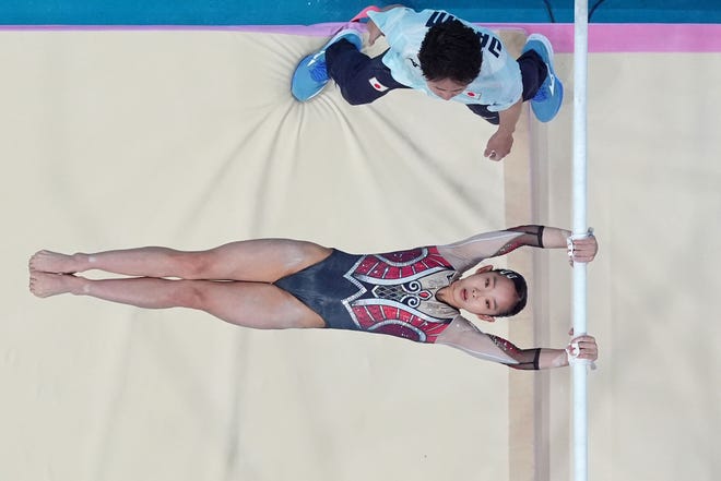 Haruka Nakamura of Japan performs on the uneven bars in womenÕs qualification during the Paris 2024 Olympic Summer Games at Bercy Arena.