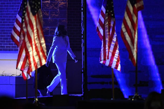 Vice President- Elect Kamala Harris walks onstage.